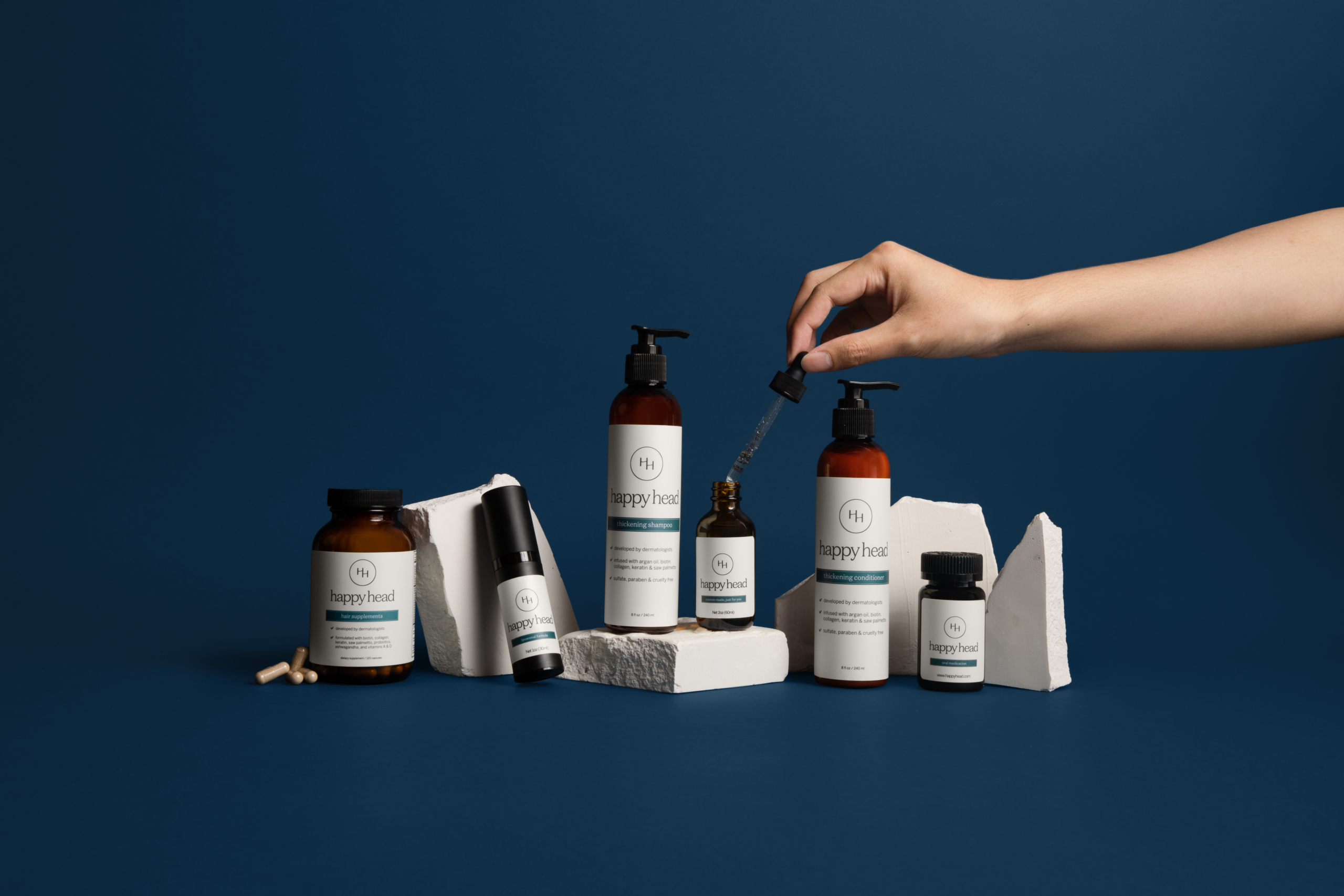 Happy Head's selection of custom topical and oral hair growth solutions for men and women. Get prescription hair growth medication to stop hair loss and promote growth. 